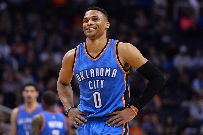 Feb 8, 2016; Phoenix, AZ, USA; Oklahoma City Thunder guard Russell Westbrook (0) smiles on the court in the game against the Phoenix Suns at Talking Stick Resort Arena. Oklahoma City won 122- 106. Mandatory Credit: Jennifer Stewart-USA TODAY Sports